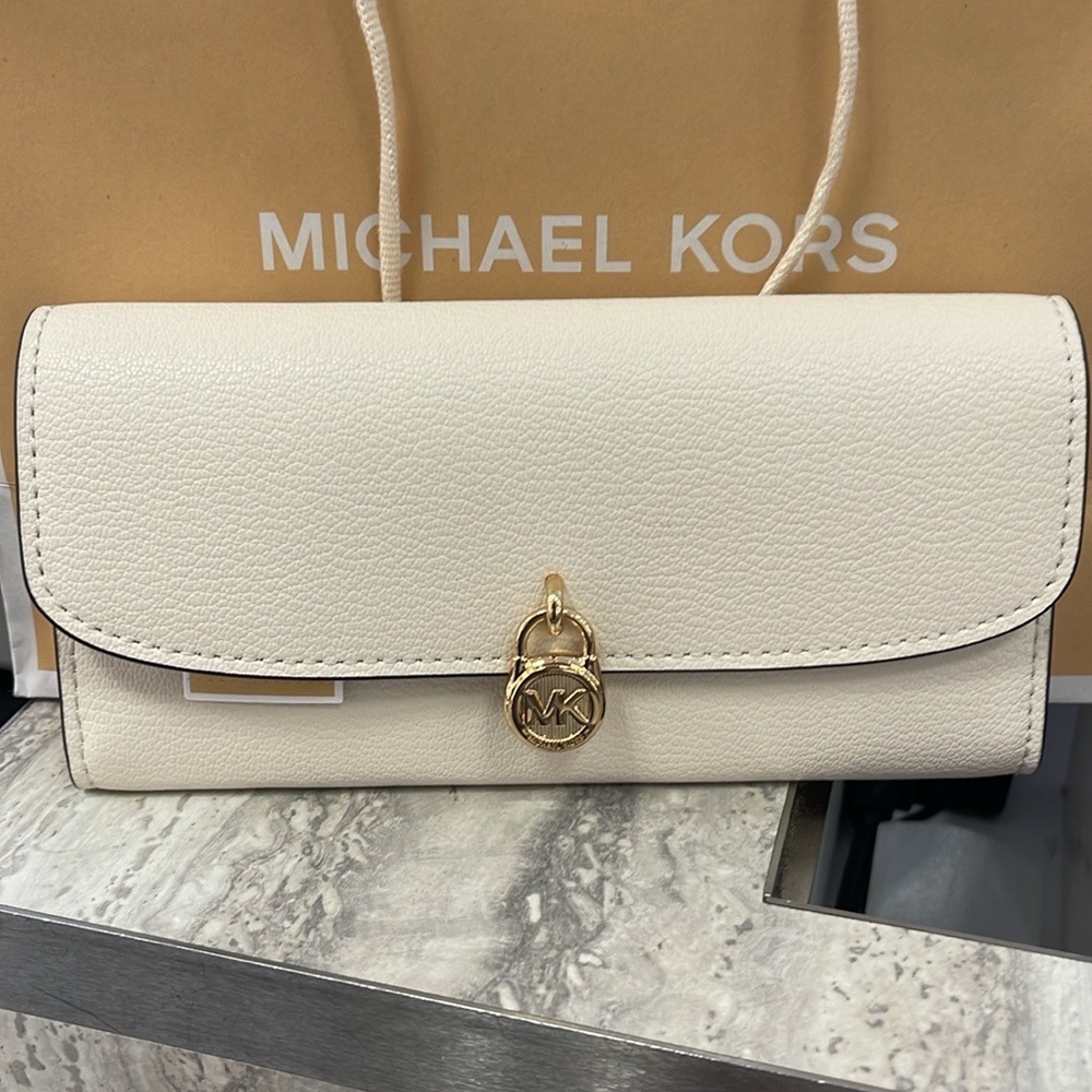 Michael Kors Hamilton Large Leather Continental Wallet
Light Cream
NWT - Picture 13 of 16